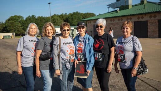 A group of six women pose for a photo before the MMIW 5k Walk in Antlers, Oklahoma.