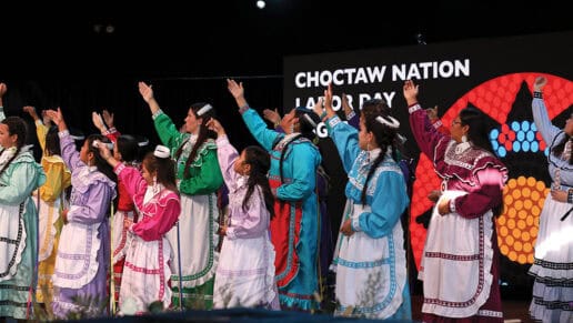 All of the contestants perform the Lord's Prayer to open the pageant.