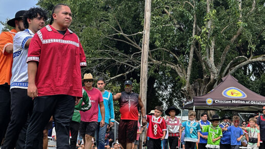 The snake dance is performed by many people.