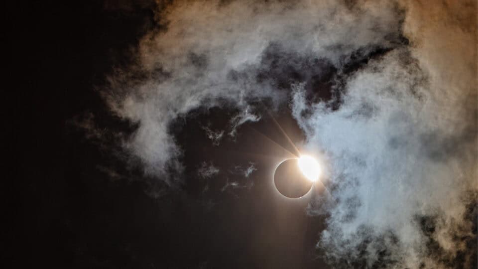 the moon can be seen passing in front of the sun.