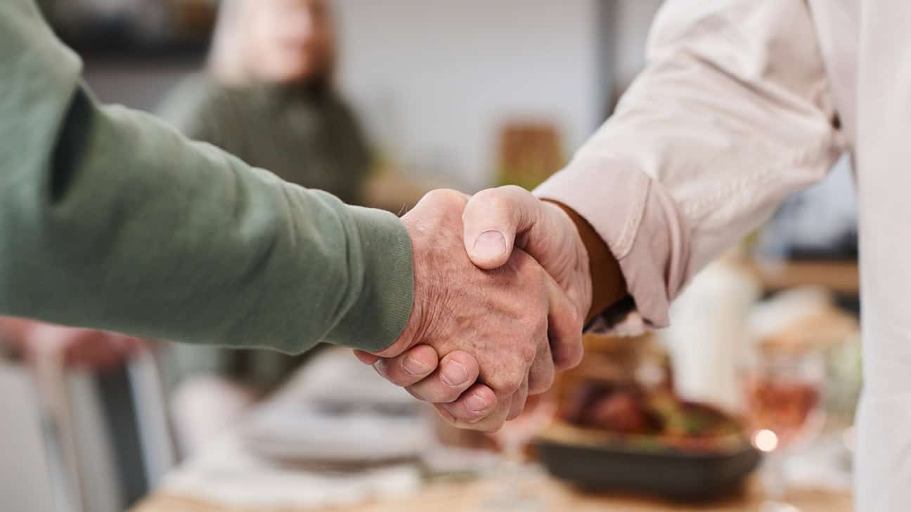 Two voters shaking hands